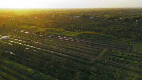 A-breathtaking-aerial-time-lapse-captures-the-magic-of-dawn-over-a-picturesque-countryside-farm