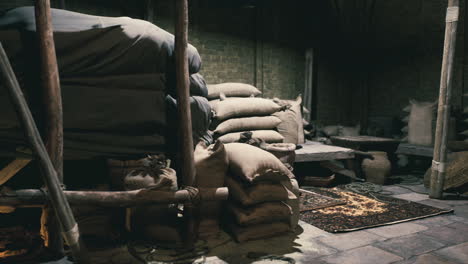 exploring an old national african market filled with bags of various produce