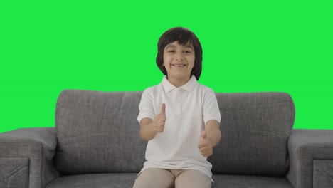 Happy-Indian-boy-showing-thumbs-up-Green-screen