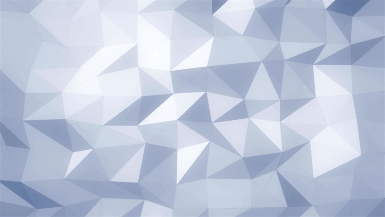 Polygonal abstract mesh slowly undulating.