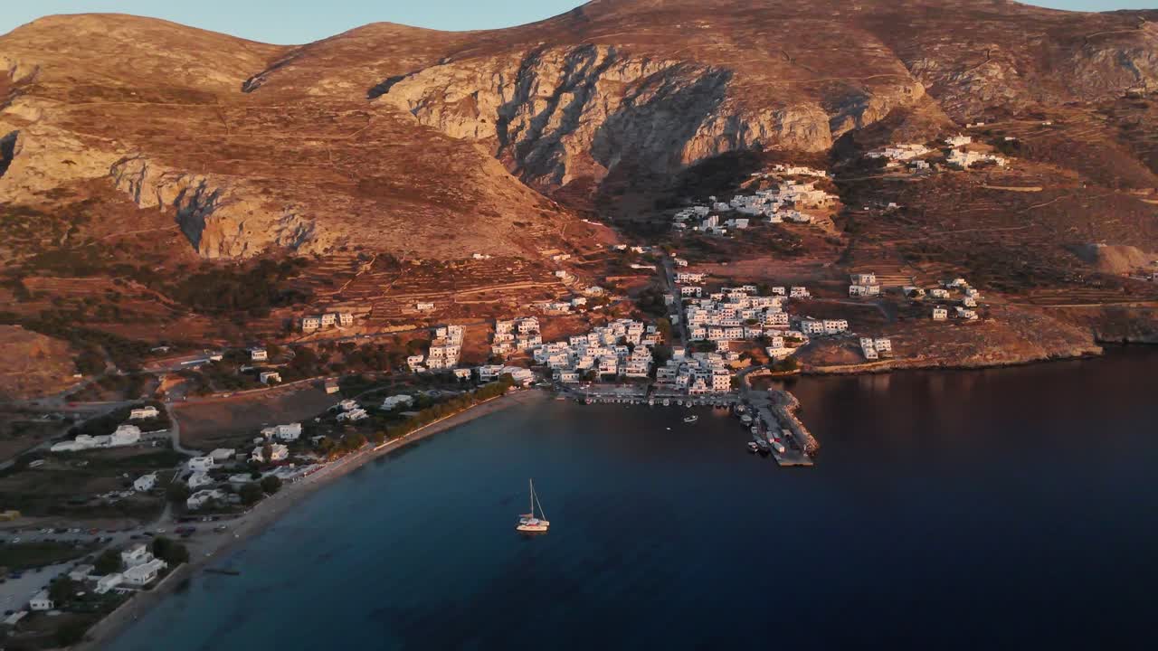 Afternoon drone shot at port of Aigiali | Greek island Amorgos | 4K aerial
