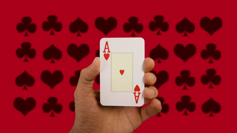 hand holding playing cards