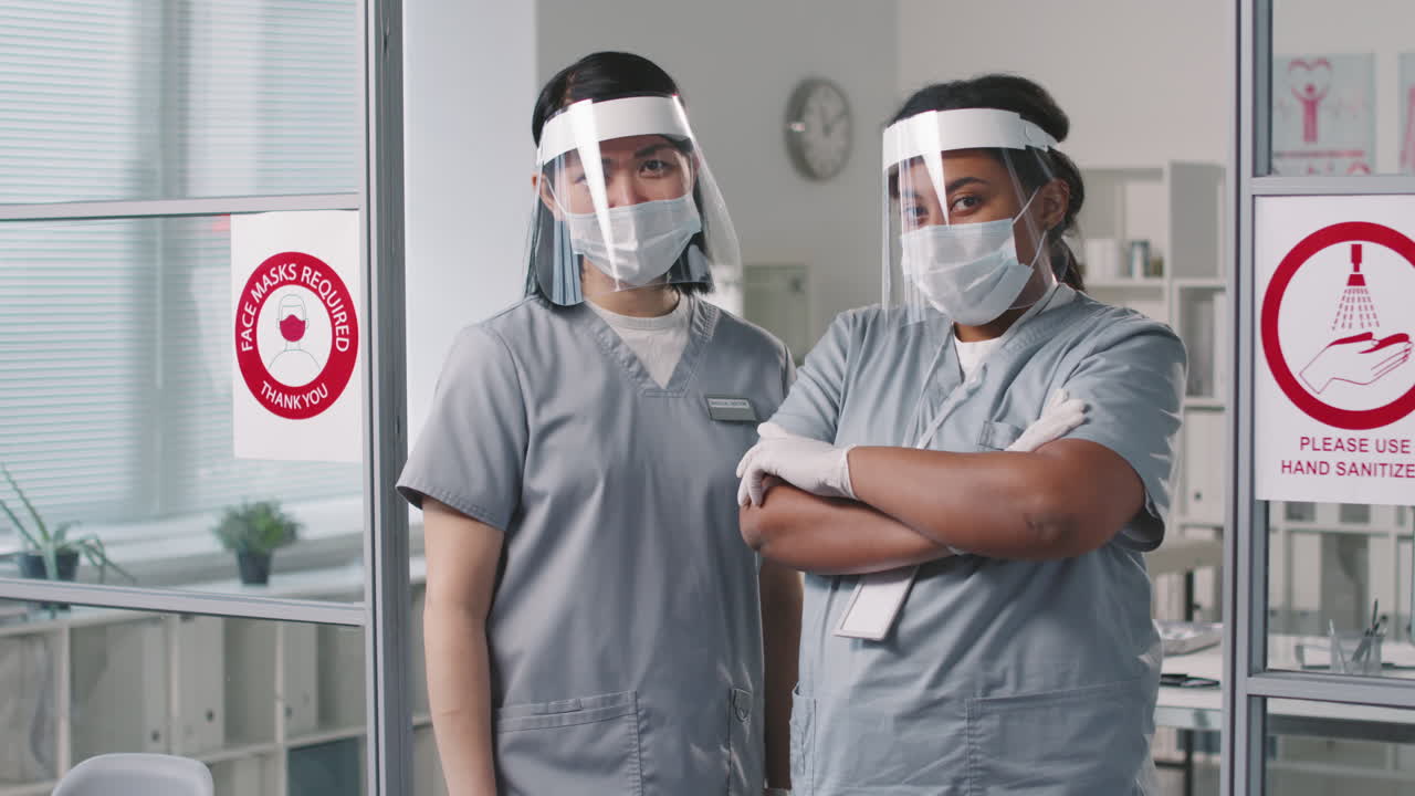 Portrait Of Nurses In Face Shields