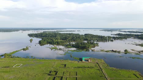 aerial view of flooded land area submerged in flood water in bangladesh