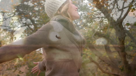 woman dancing under the trees