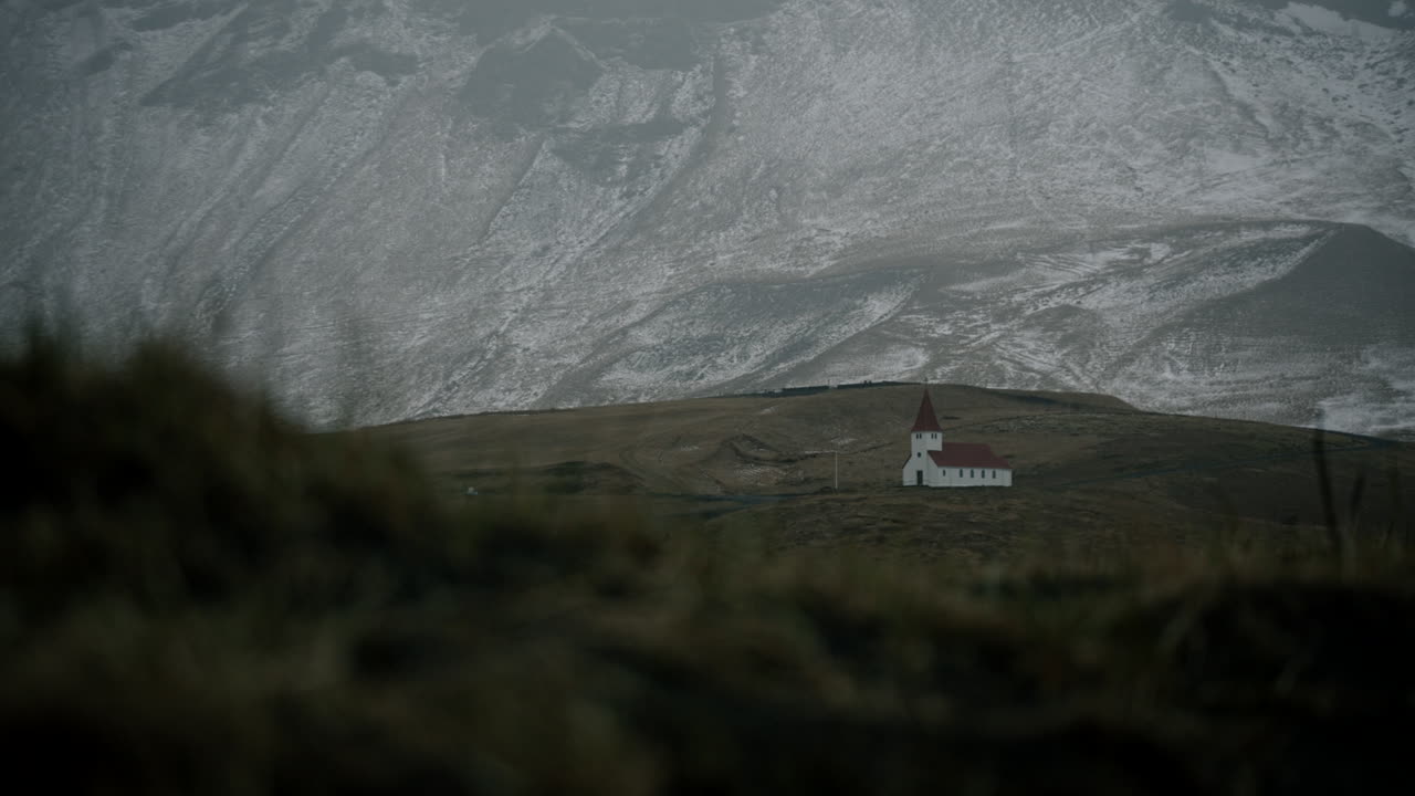 Icelandic Church in Snowy Mountains