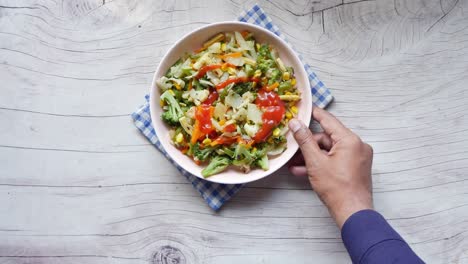 blue checkered napkin with vegetable stir-fry