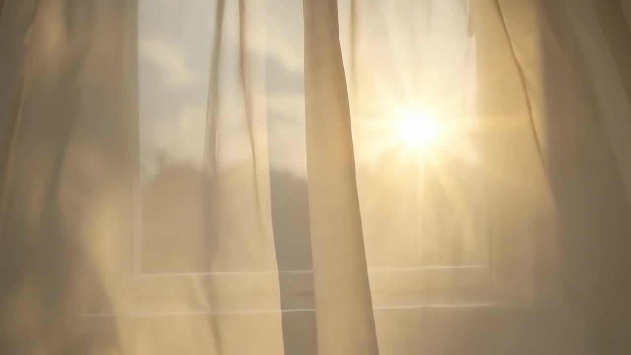 Soft sunlight filters through sheer curtains, creating a serene video ambiance