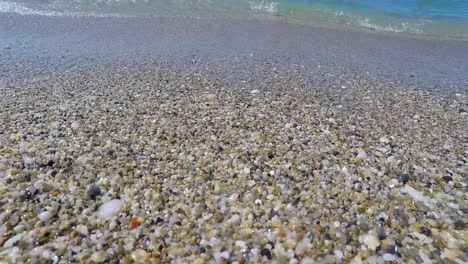 Waves-of-Mediterranean-Sea-rolling-in-sunshine-to-the-sandy-beach