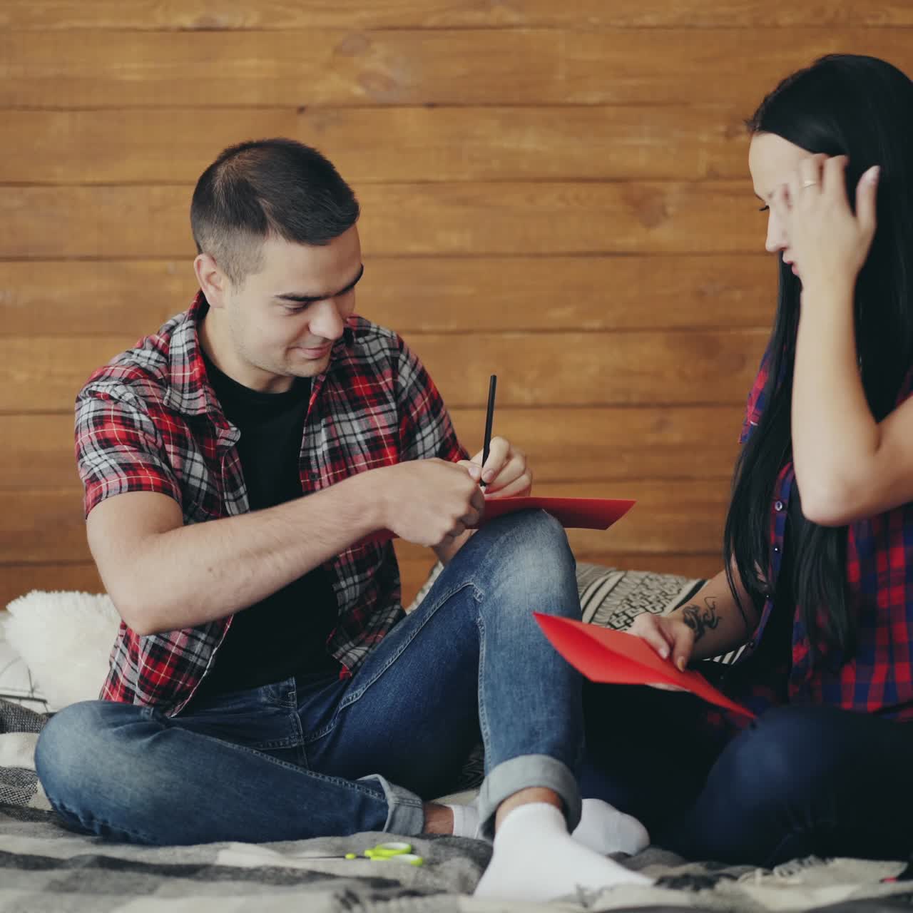 Smiling young couple in studio