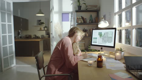 female freelancer working in cozy home