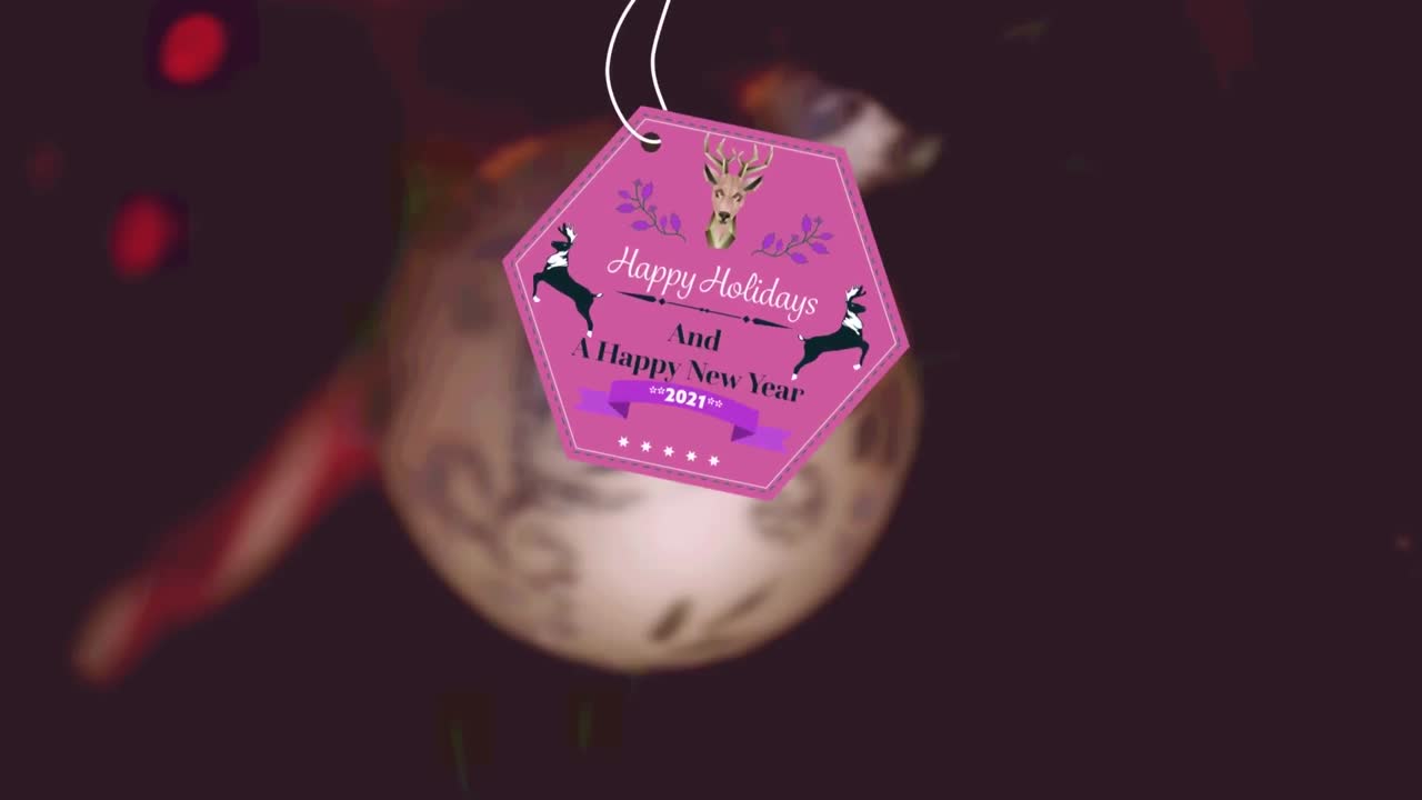 animazione del tag presente con gli auguri di natale sulla decorazione di natale