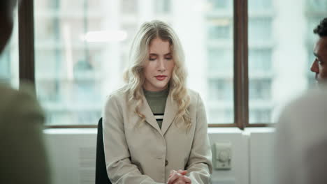 upset woman in office setting