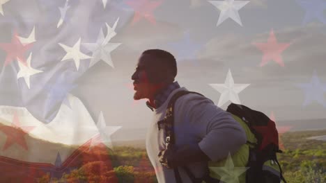 animación de la bandera estadounidense sobre un hombre afroamericano caminando por las montañas