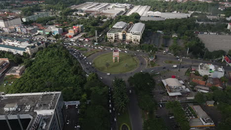Aerial-View-Of-Heavy-Traffic-By-The-Roundabout-In-Jakarta,-Indonesia-During-Rush-Hour