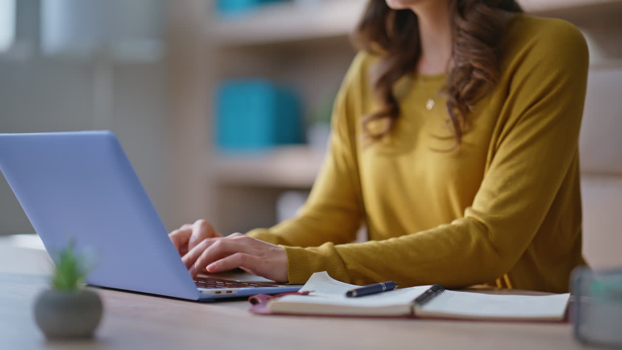 Marketing specialist making research internet writing data in notebook closeup