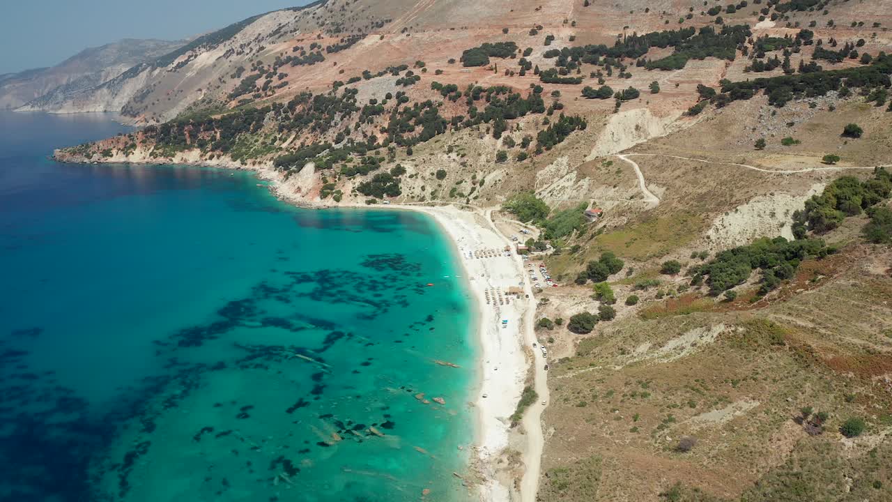 Aerial top down view idyllic sandy beach of Agia Kiriaki with emerald water, Greece