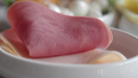 sliced ham on white plate