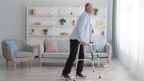 elderly man using walker in living room