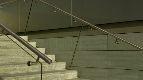 A-close-up-view-of-a-staircase-with-light-colored-stone-steps