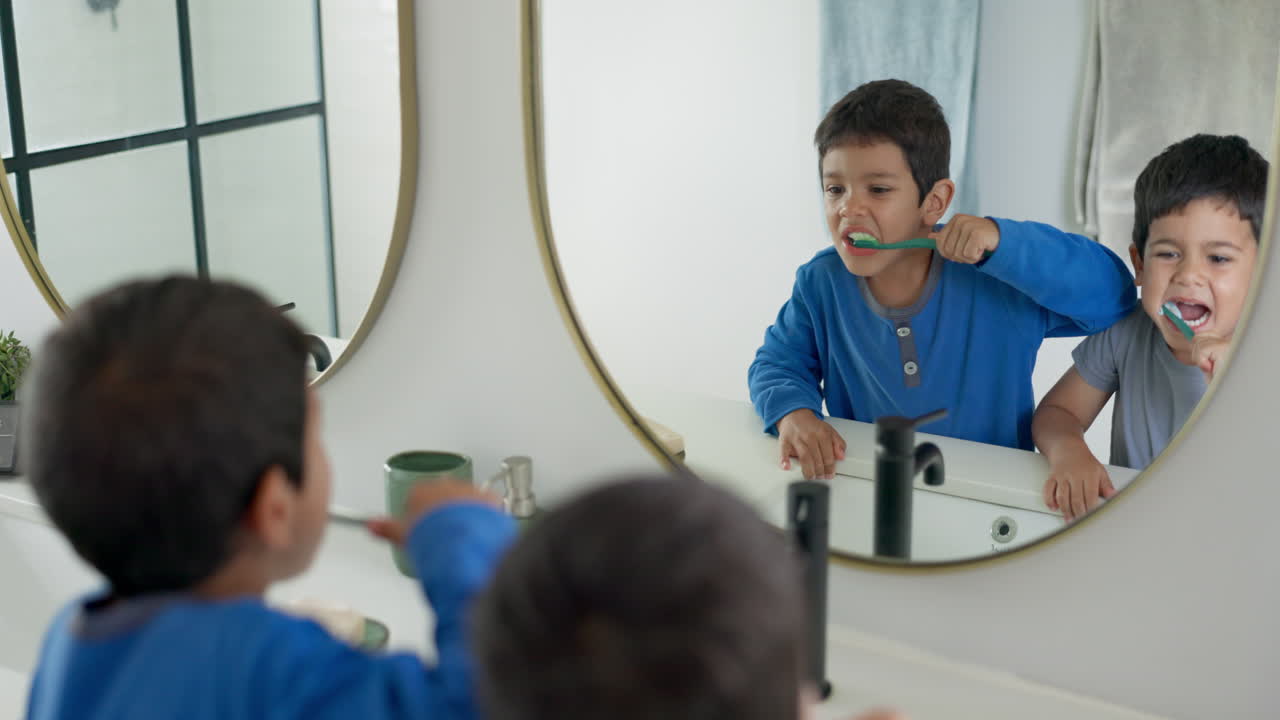 Premium stock video - Boy kids, toothbrush and together in bathroom