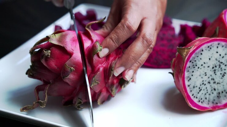 Close up of Red and white dragonfruit Red Dragon Fruit Slices and Cultivating Exotic Plants pitaya