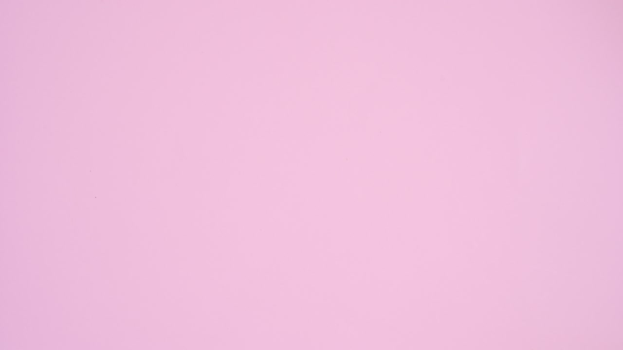 Valentine's day love balloons and sweet desserts with gift appear on pastel pink theme. Stop motion flat lay