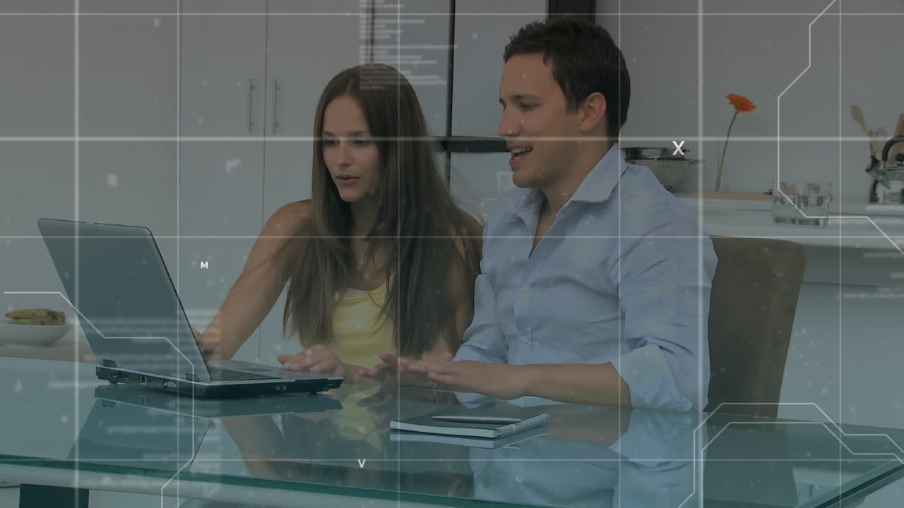 animación de una pareja sentada junto a un escritorio sobre una red de conexión en el fondo.