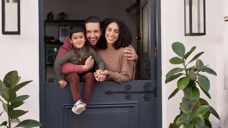 happy, love and face of a family by the door