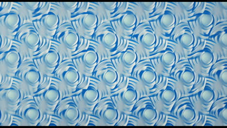 animation of spiral blue shapes moving on blue background