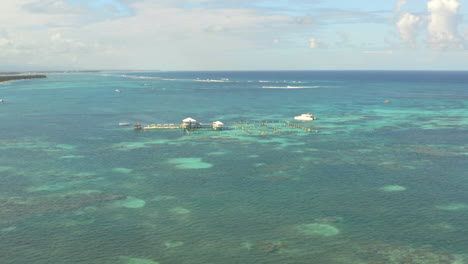 Dolphin-explorer-sea-attraction-offshore-Punta-Cana-coast,-drone