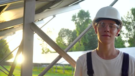 engineer in a special equipment is at the solar power station. concept renewable energy