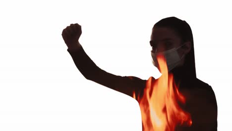 doble exposición silueta protesta activista fuego