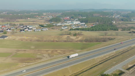 Aerial-view-of-highway-with-rural-landscape