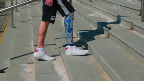 man with prosthetic leg climbing stairs