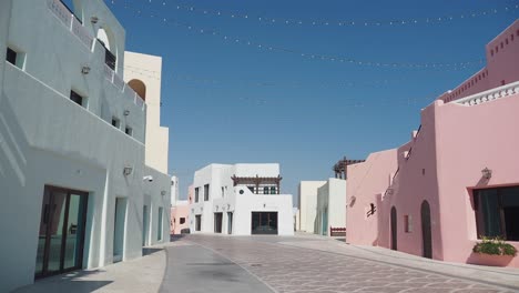 colorful street scene with pastel-colored buildings