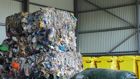 stack of different types of large garbage dump, plastic bags, and landfill full of trash, environmental pollution, medium shot camera tilt up