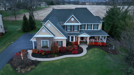 large mansion estate decorated for winter christmas holidays