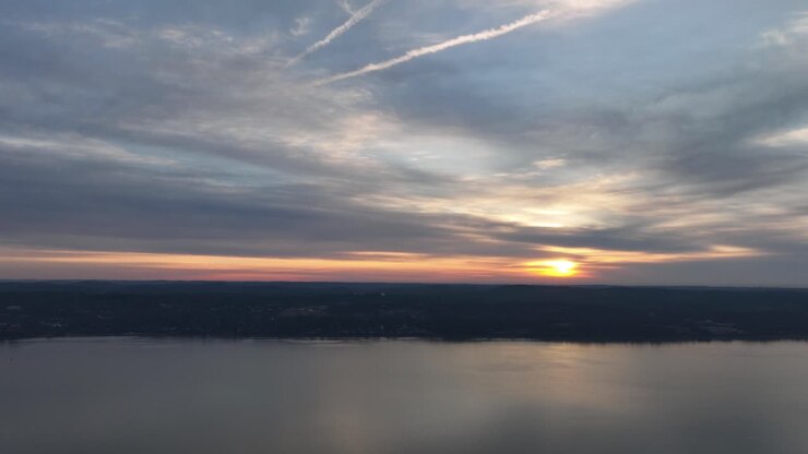 An aerial time lapse of a colorful sky at sunrise