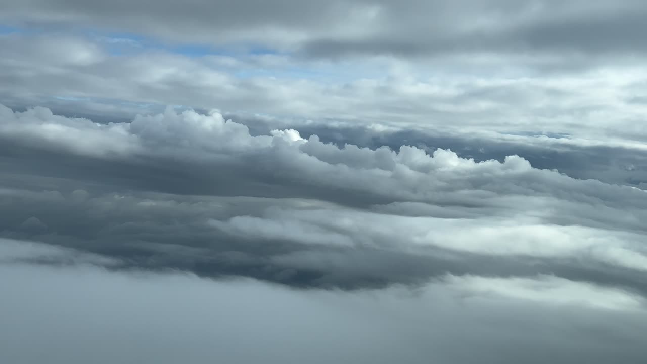 A pilot&rsquo;s perspective while flying through a dramatic winter sky during a left turn