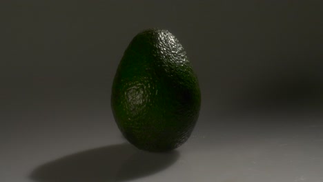 ripe green avacado on a white background