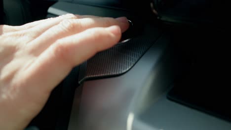 close-up of a car engine start/stop button