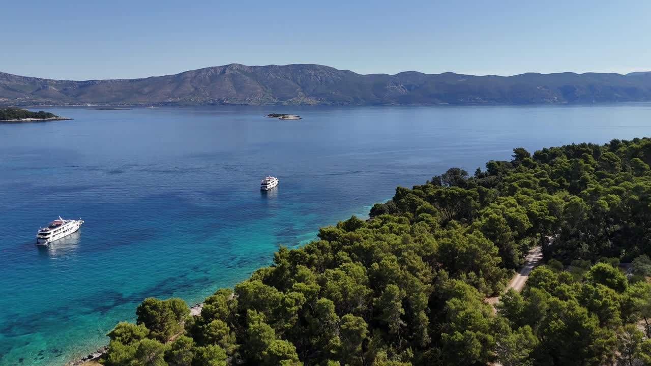 Aerial drone view of boats and ships cruise sail sailing in the adriatic sea off the coast of croatia