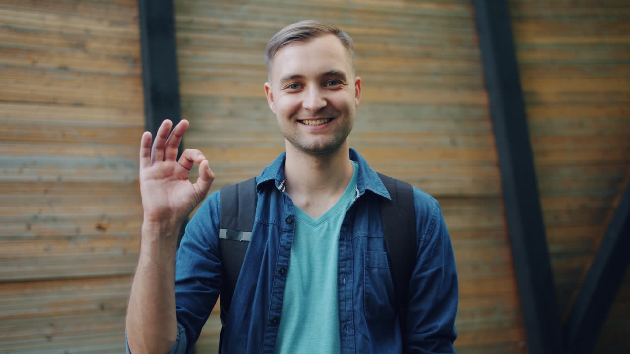 Smiling Man with Backpack