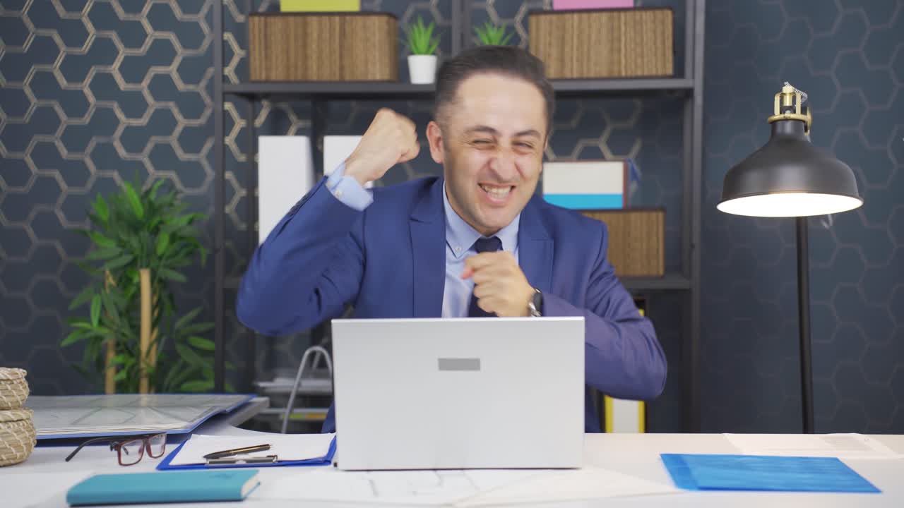 Portrait of joyful businessman.