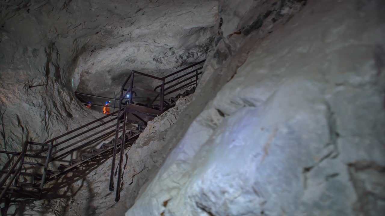 Miners listening to the instructions of their engineer at the underground mining site