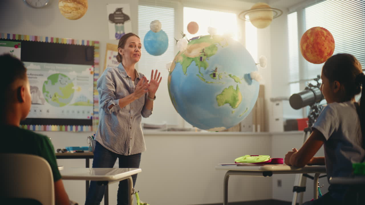 STEM Class on Renewable Energy Female Teacher Explaining Energy Sources to Elementary School