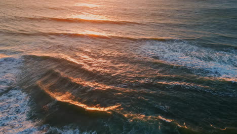 sunset ocean reflecting sun closeup. marine sunrise in calm morning sea surface