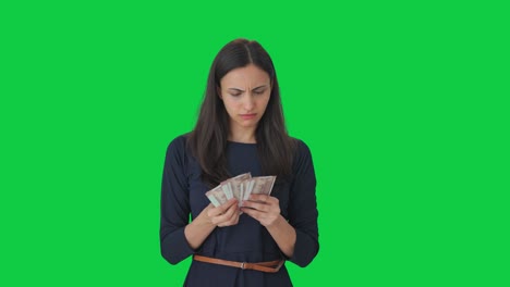 Sad-Indian-girl-loses-money-Green-screen