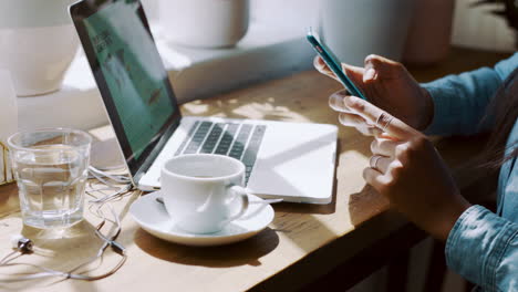 Coffee-shop,-laptop-and-woman-hands-on-smartphone